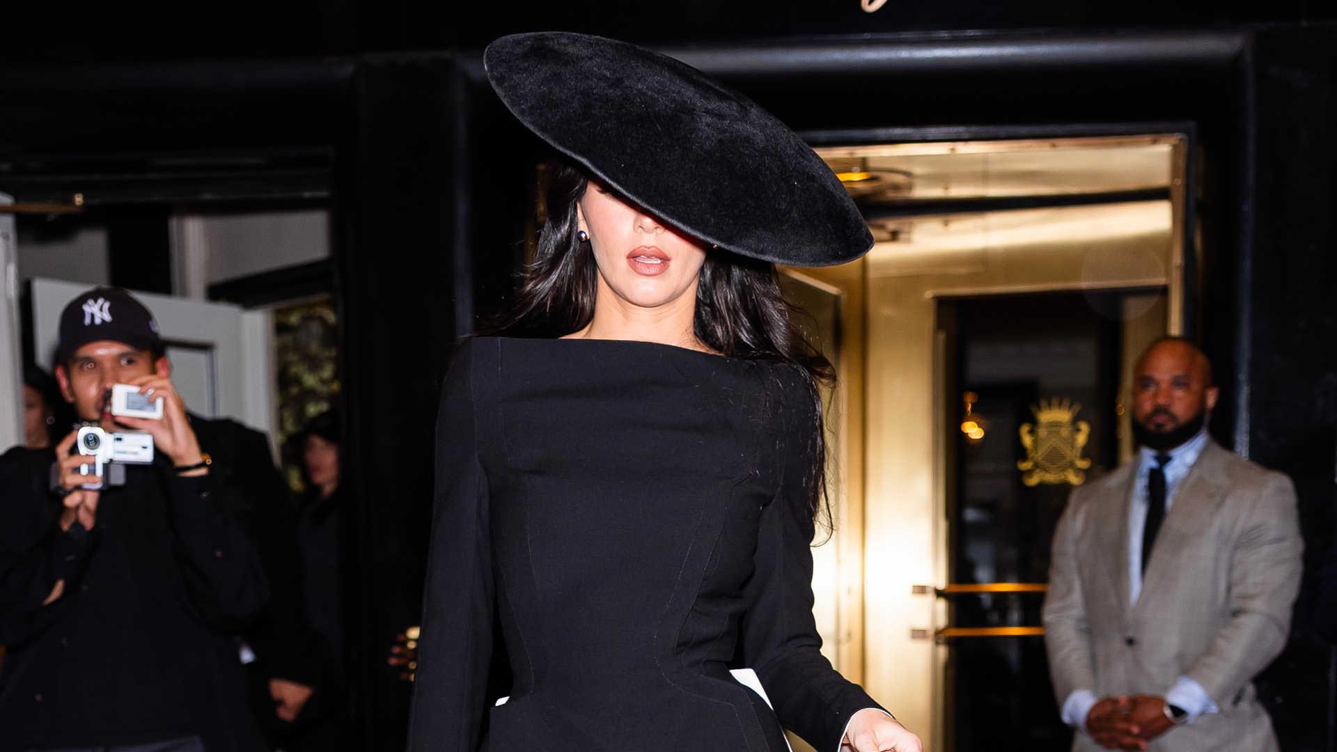 Kendall Jenner wearing a titled hat and boatneck top for the 2025 Met gala after party