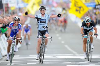 Nick Nuyens wins the 2011 Tour of Flanders from Sylvain Chavanel and Fabian Cancellara.