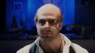 Tom Cruise looking nearly unrecognizable with a bald cap and fat suit in Tropic Thunder, as Les Grossman. 
