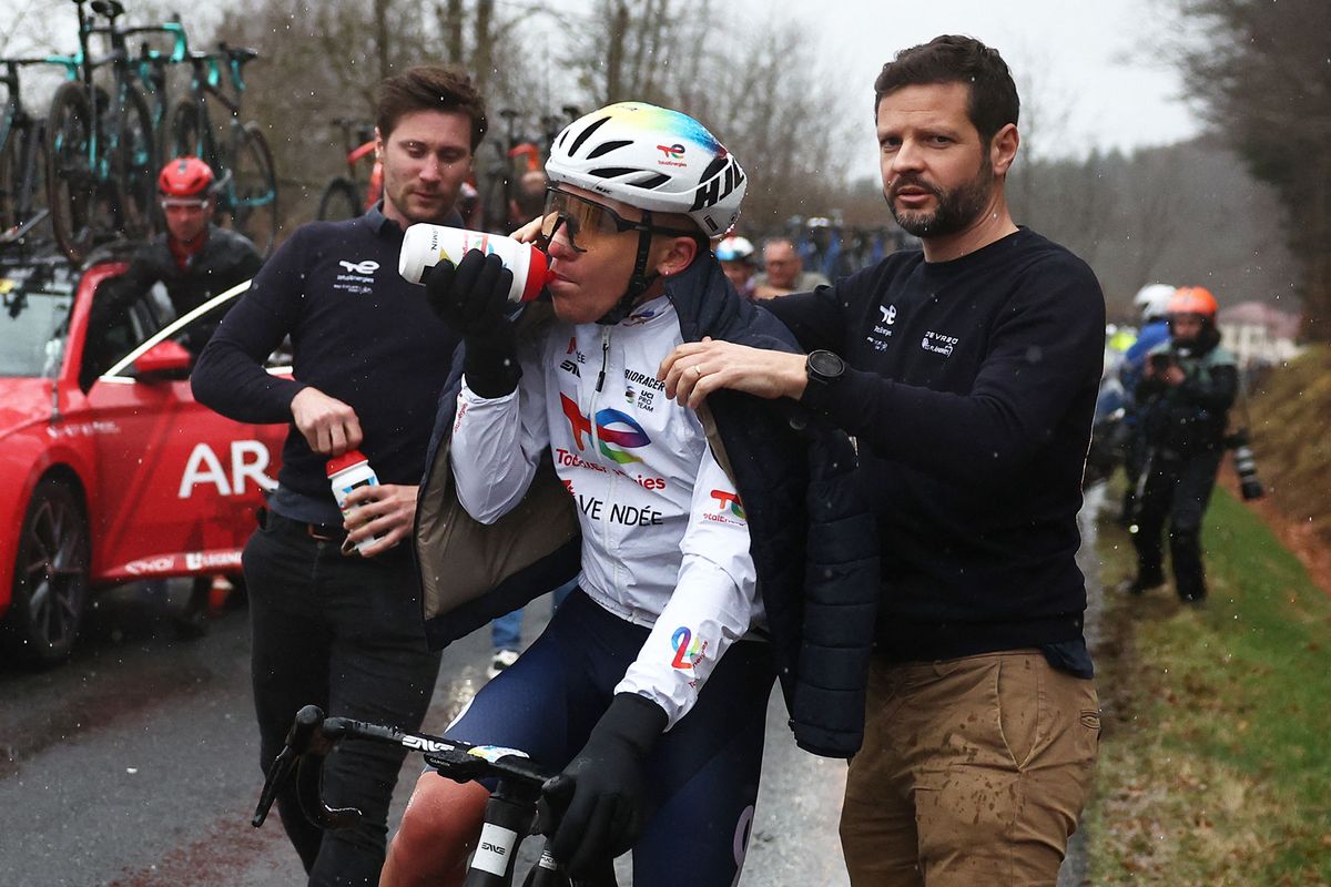 Teams worked tirelessly to keep riders warm after the neutralisation
