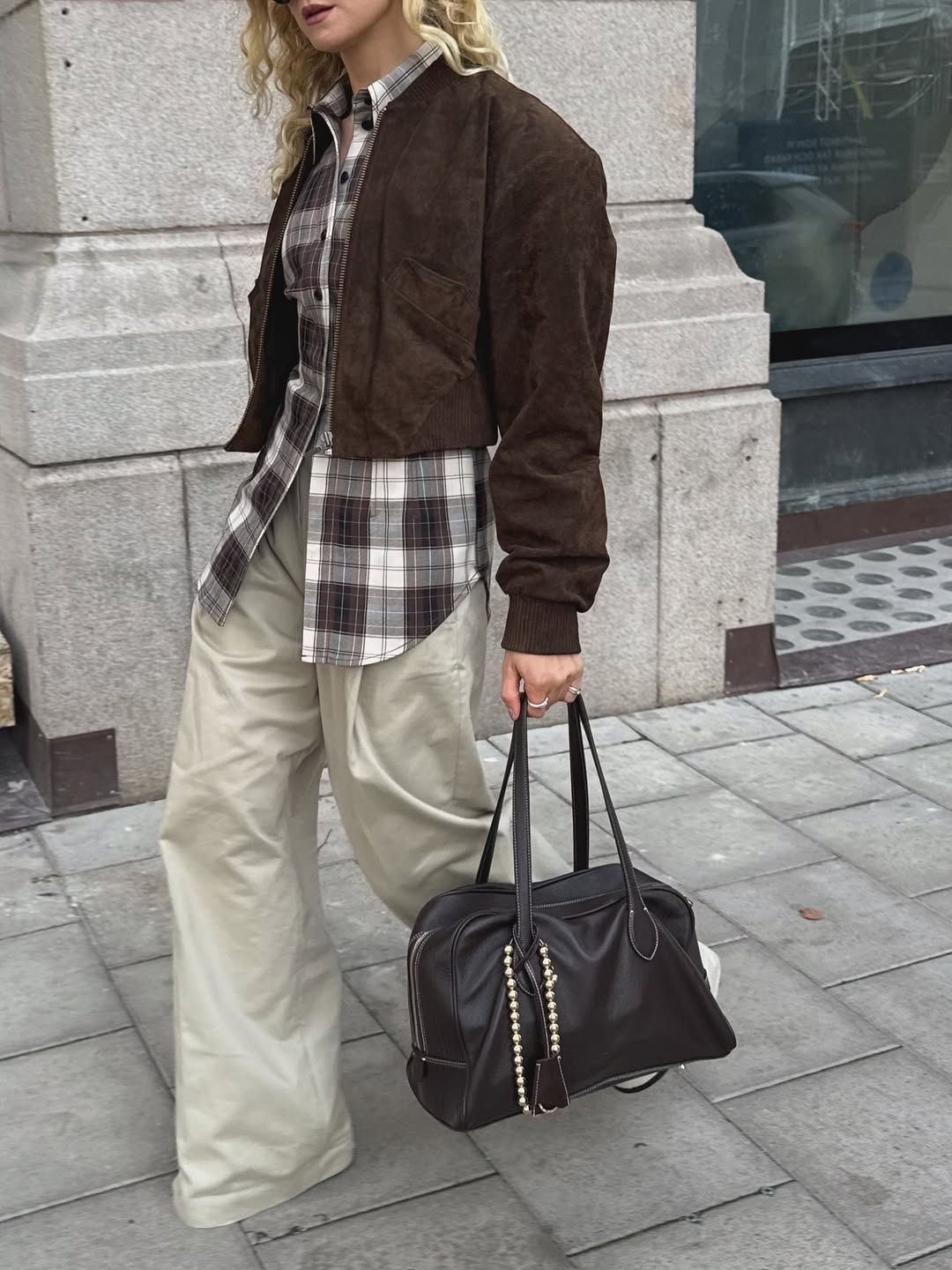 Fanny wearing tartan shirt