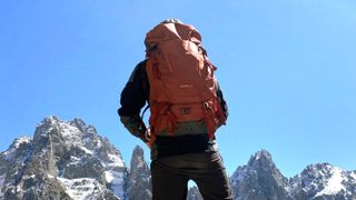 Alex in the Dolomites with Osprey Kestrel 38 backpack