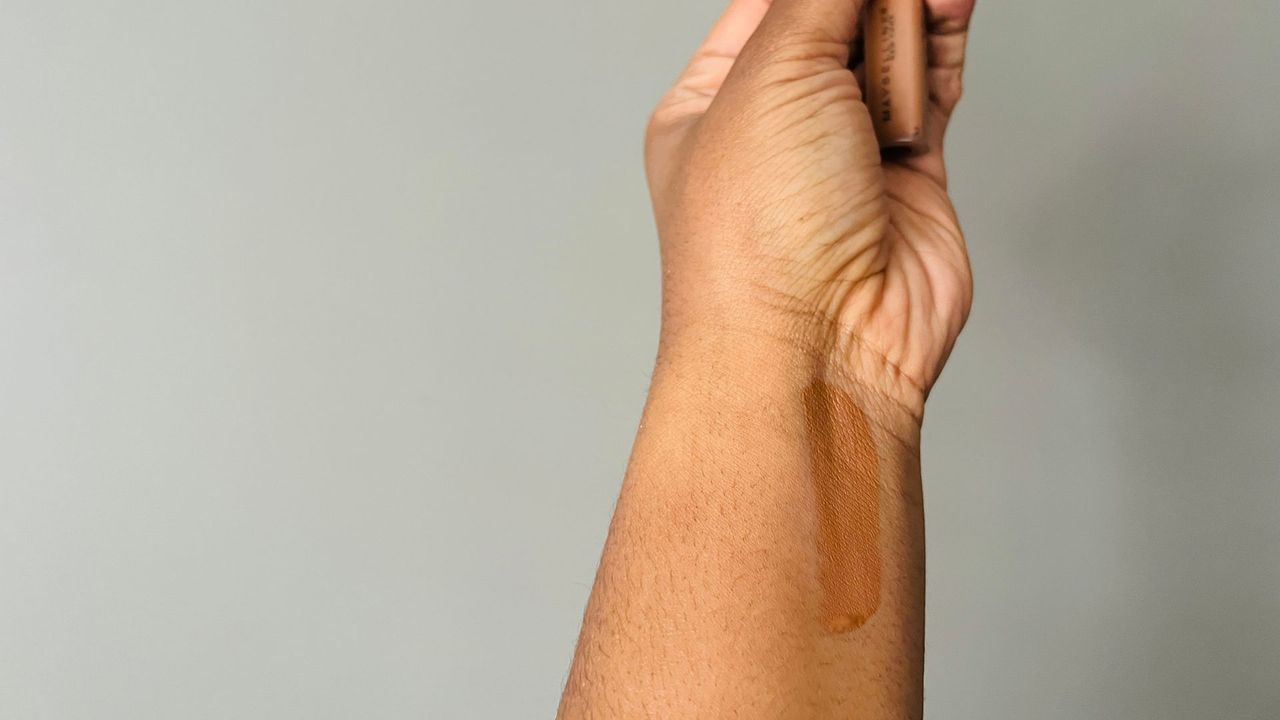 A color swatch on a person's wrist of the Maybelline Fit Me Concealer for the best drugstore concealers.