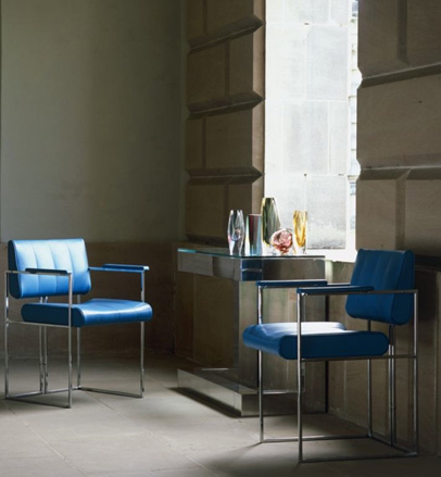 Talisman: A pair of 1970s American turquoise leather upholstered armchairs