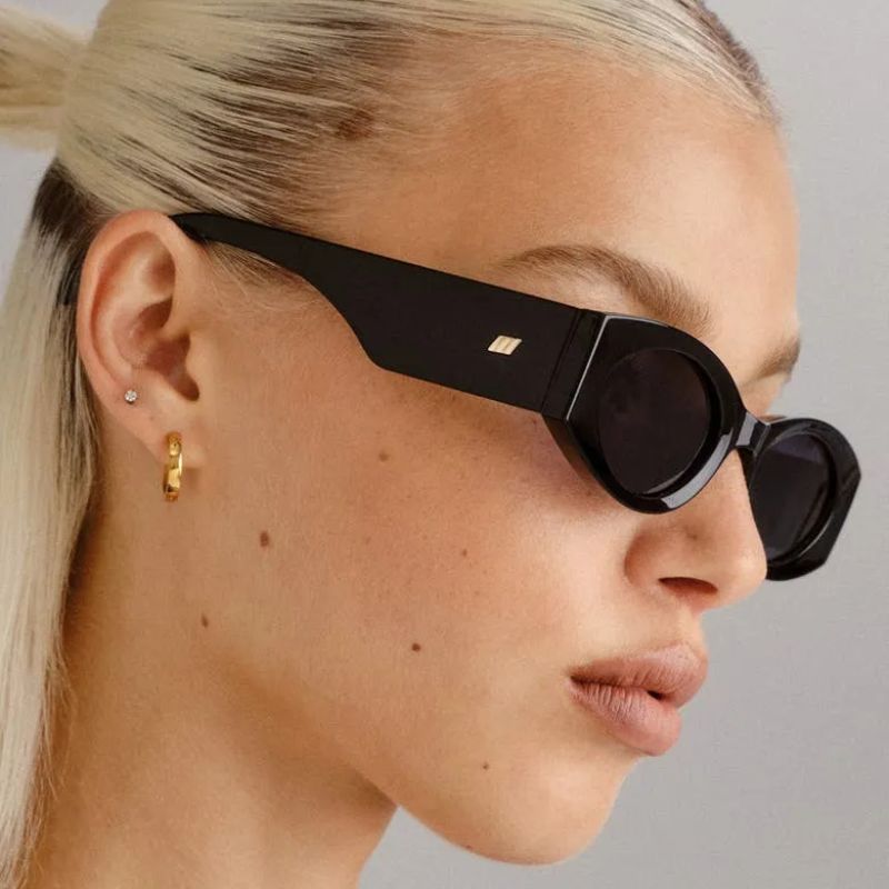 Le Specs sunglasses on model 
