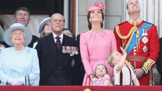(L-R) Queen Elizabeth II, Prince Philip, Duke of Edinburgh, Catherine, Duchess of Cambridge, Princess Charlotte of Cambridge, Prince George of Cambridge and Prince William, Duke of Cambridge look out from the balcony of Buckingham Palace during the Trooping the Colour parade on June 17, 2017 in London, England