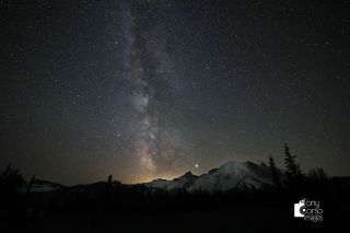 Can you spot the meteor in the Milky Way? After taking this photo of the night sky over Mount Rainier in Washington state on July 30, astrophotographer Tony Corso was surprised to find a tiny trail of a meteor near the center of this image. Look for the short streaker on the right edge of the Milky Way's dusty band. The meteor was likely a member of either the Southern Delta Aquarid meteor shower or the Alpha Capricornids, both of which peaked at the end of July. It could have also been a Perseid meteor, although that shower didn't peak until about two weeks later.