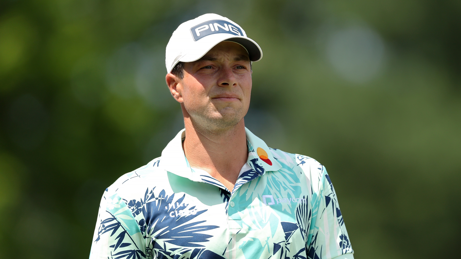 Viktor Hovland walks off the green
