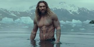 Momoa, shirtless, in the freezing water