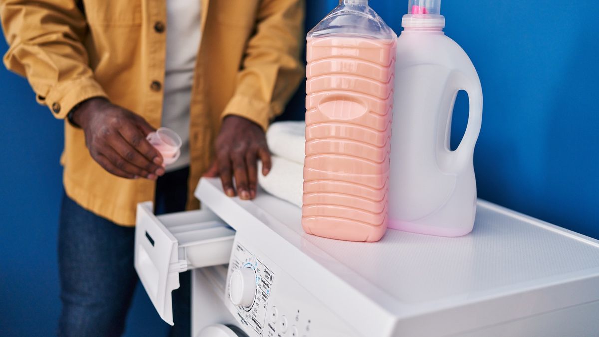 Laundry detergent and fabric softener on washer