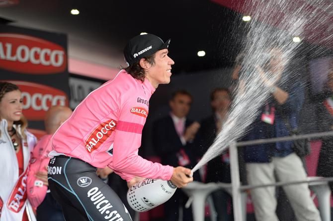 Rigoberto Uran (Omega Pharma-Quickstep) celebrates another day in the maglia rosa