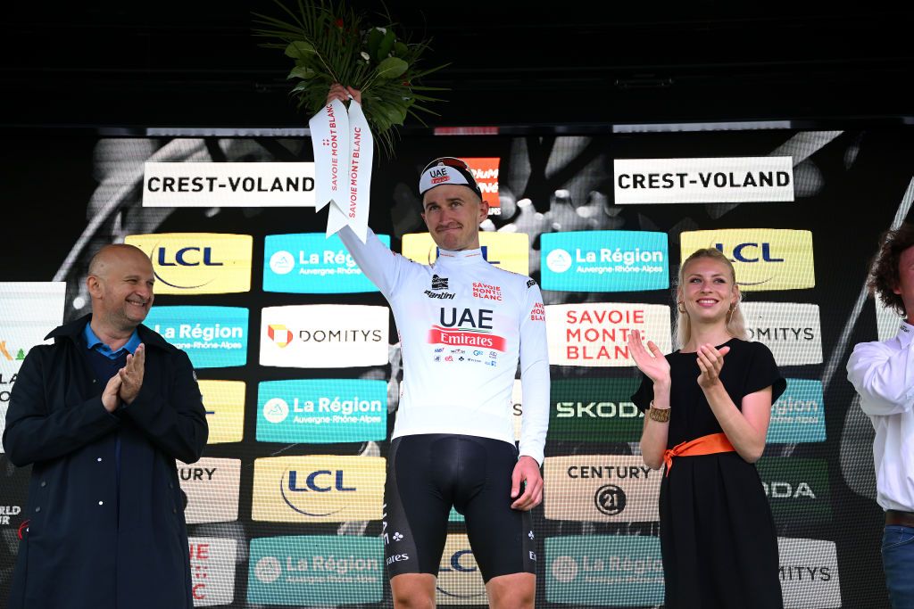 CRESTVOLAND FRANCE JUNE 09 Mikkel Bjerg of Denmark and UAE Team Emirates Wanty White Best Young Rider Jersey celebrates at podium during the 75th Criterium du Dauphine 2023 Stage 6 a 1702km stage from Nantua to CrestVoland 1218m UCIWT on June 09 2023 in CrestVoland France Photo by Dario BelingheriGetty Images