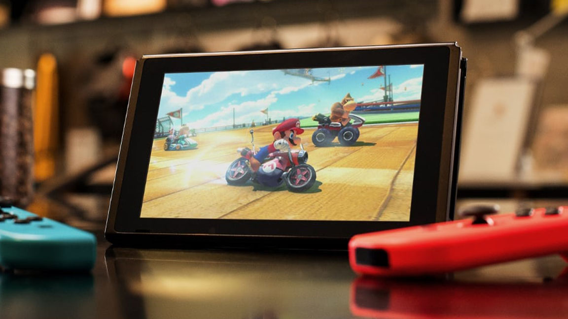 Refurbished games consoles; the best Nintendo Switch games are represented by a photo of a Nintendo Switch playing Mario Kart