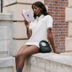 An image of preppy fashion worn by a French fashion influencer