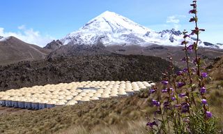 Water tanks for the HAWC detector with Picode Orizaba in the background.