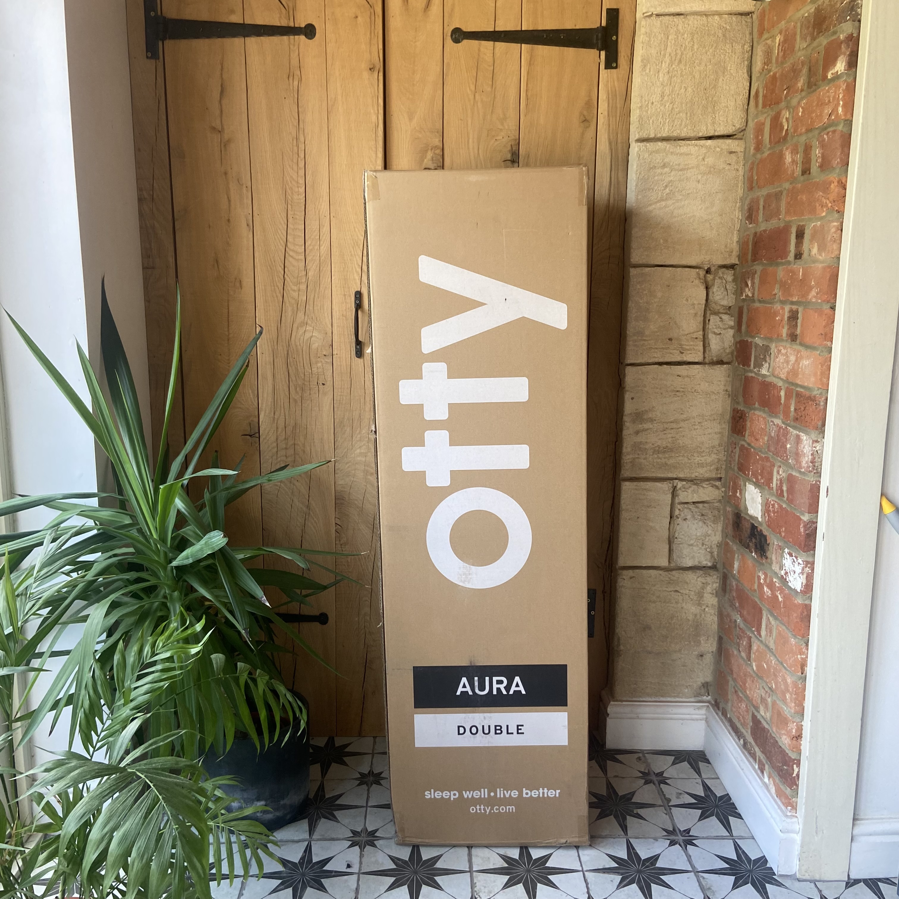 The OTTY Aura Hybrid mattress being tested at home