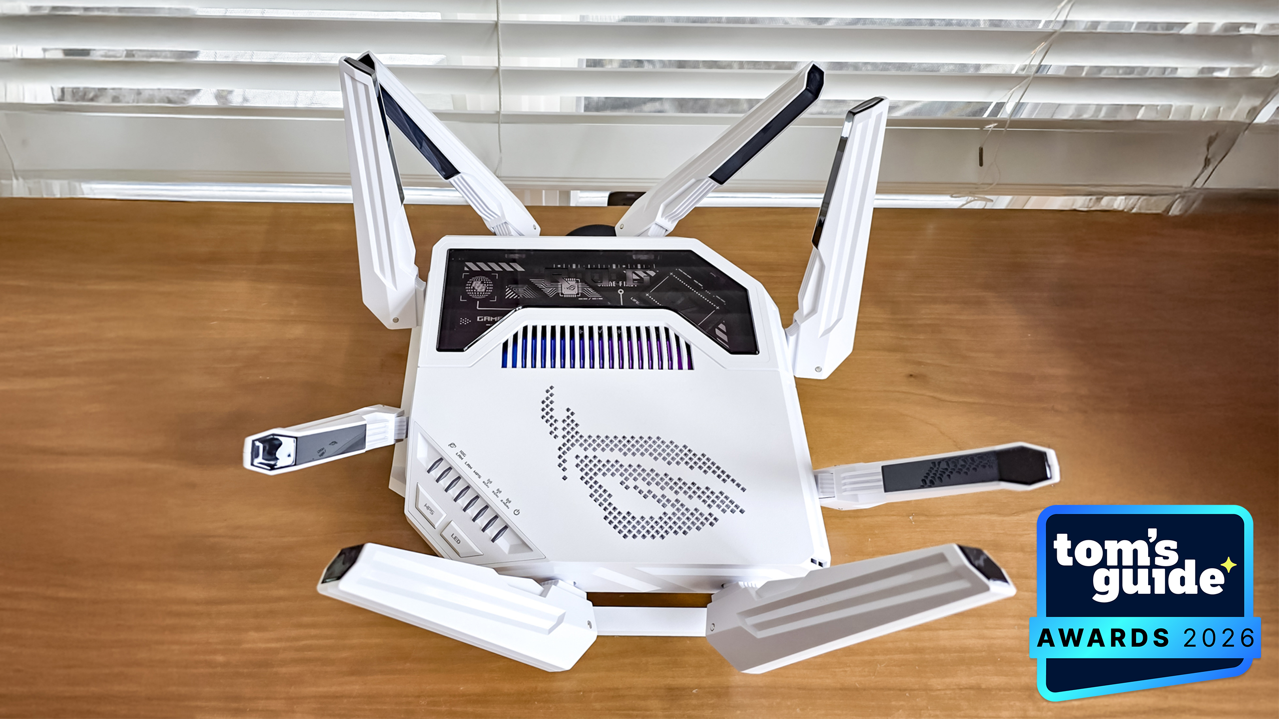 The Asus ROG Rapture GT-BE19000AI router with a TG Awards 2026 badge
