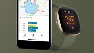 Fitbit Versa 3 and smartphone with Fitbit mobile app