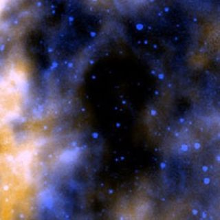 Herschel Image Hole in Milky Way Dust Cloud