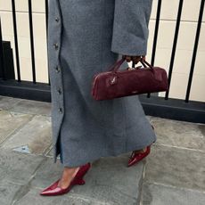 @nlmarilyn carries an Alaïa top-handle bag