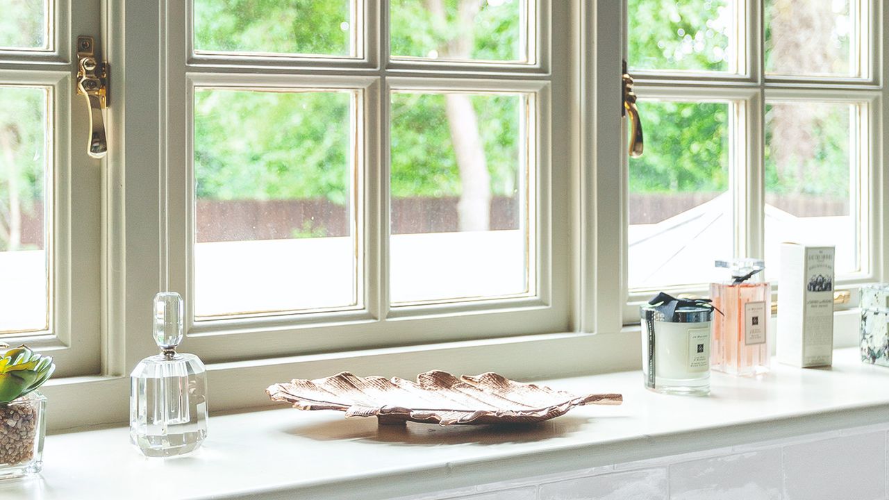 White window and windowsill with decorative items