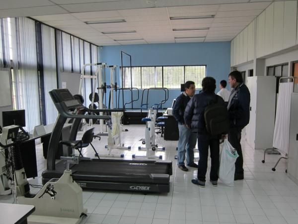 Team management get a tour of the testing facility at the Coldeportes headquarters in Colombia.