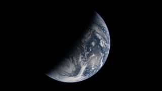 A photograph of the Earth taken on the Artemis II mission