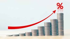 stacks of coins signifying rising interest rates