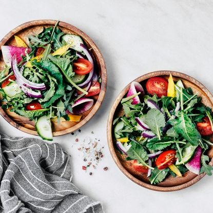 Healthy salad dressings: Two salad bowls