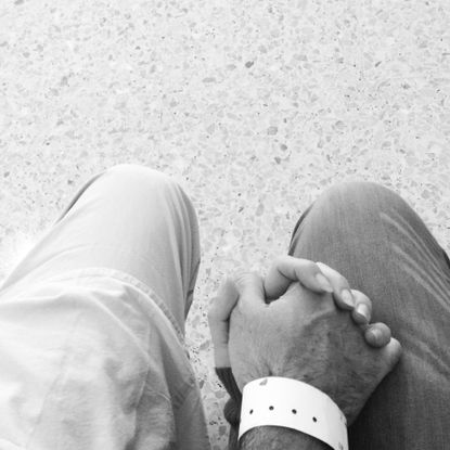 Holding hands at the hospital.