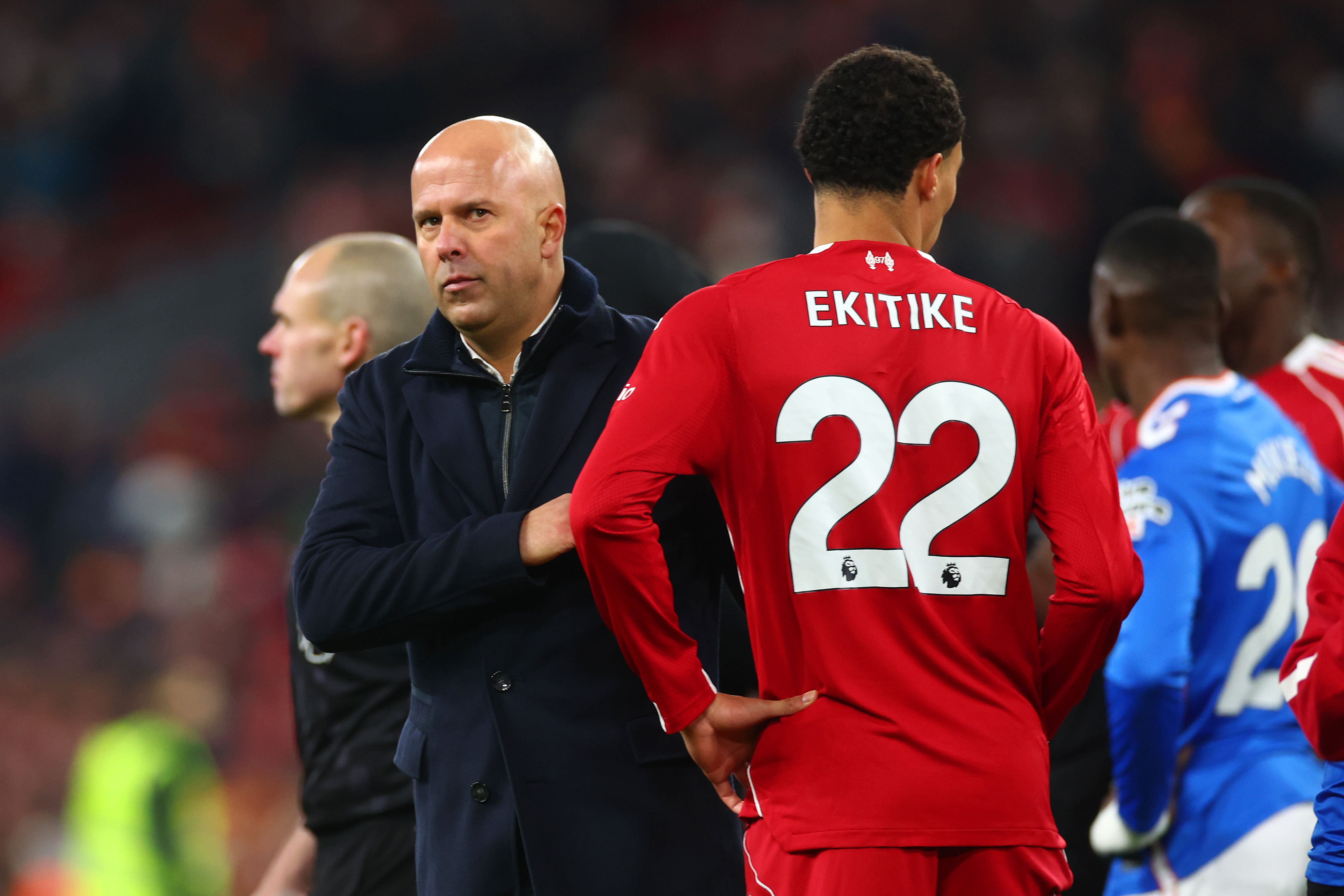 LIVERPOOL, ENGLAND - DECEMBER 03: Liverpool manager Arne Slot next to Hugo Ekitike at full-time following the Premier League match between Liverpool and Sunderland at Anfield on December 03, 2025 in Liverpool, England. (Photo by Chris Brunskill/Fantasista/Getty Images)
