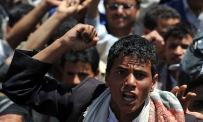 A Yemeni anti-government rebel shouts during a March protests.