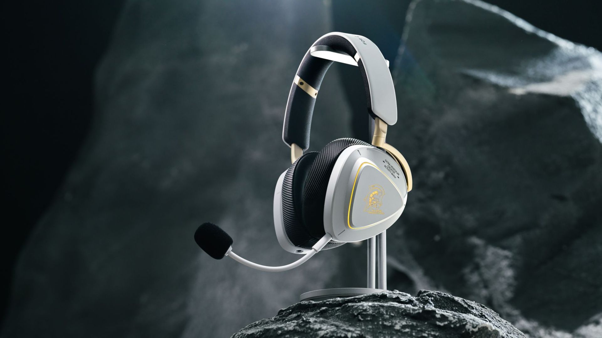 Asus x Kojima Productions gaming headset on a rock