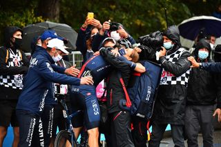 CAMIGLIATELLO SILANO ITALY OCTOBER 07 Arrival Filippo Ganna of Italy and Team INEOS Grenadiers Celebration Staff Soigneur during the 103rd Giro dItalia 2020 Stage 5 a 225km stage from Mileto to Camigliatello Silano 1275m girodiitalia Giro on October 07 2020 in Camigliatello Silano Italy Photo by Stuart FranklinGetty Images