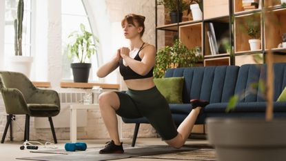Woman exercising at home