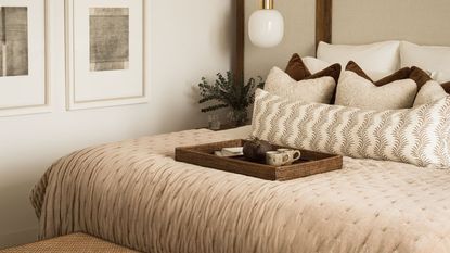 What color bedding makes a bedroom look bigger?