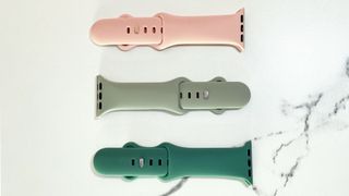 Three different coloured CeMiKa Silicone Sports Straps.