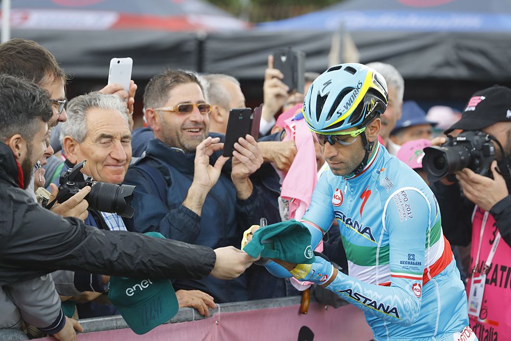 Vincenzo Nibali of Astana team signs autographs before the start before the start of the 6th stage of 99th Giro d'Italia