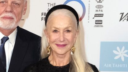 Helen Mirren glows in France with black head crown, white hair, and Baroque-style booties 