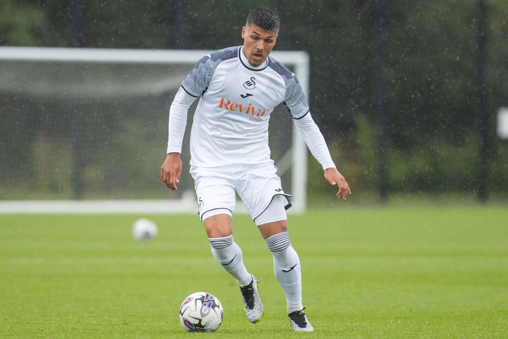 oel Piroe of Swansea City attacks during a pre-season friendly match between Swansea City and Newport County at the Fairwood Training Ground on July 18, 2023 in Swansea, Wales.