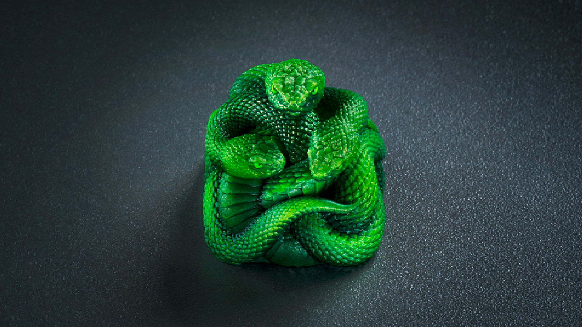 A Razer artisan keycap made of up three resin-cast, neon green snakes
