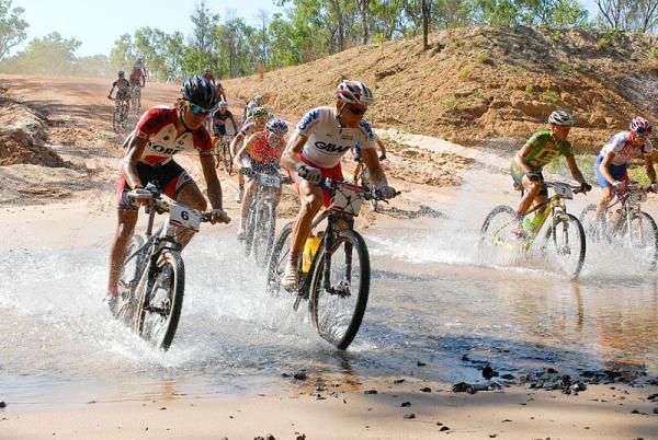 Water crossing with Geeni Yong Choi (Team Korea), Urs Huber (St&ouml;ckli Pro Team), Wolfgang Kreen and Mike Mulkens (Kipeo MTB Team)