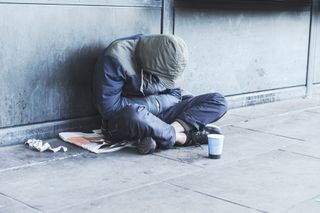 A homeless man on the street