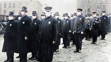Policemen in Washington D.C. wear protective masks, 1918