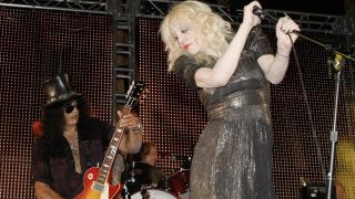 Slash and Courtney Love onstage together in 2009