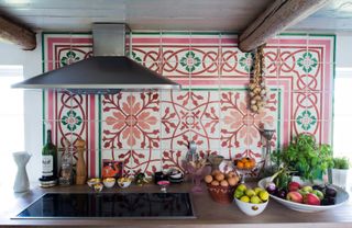 tiled splashback by cooker in Scandi home