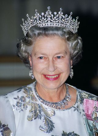 Queen Elizabeth II attends a banquet in Paris