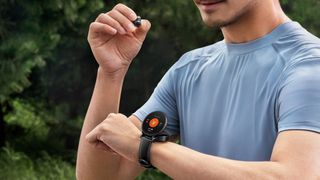 Huawei Watch Buds on a man's wrist