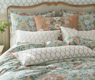 Rifle & Co x The Company Store bedding on a bed.