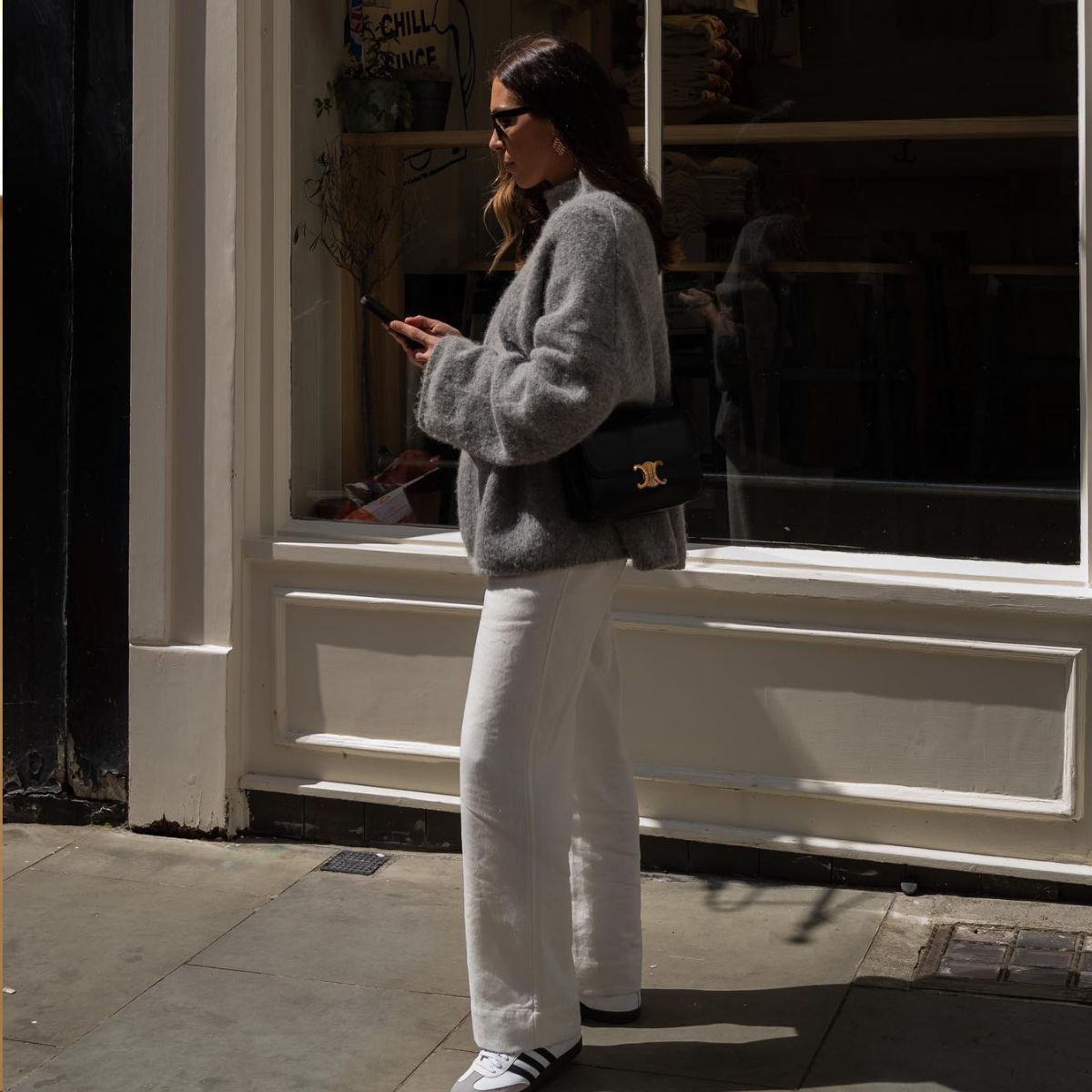 An image of @_jessicaskye wearing white sneakers.